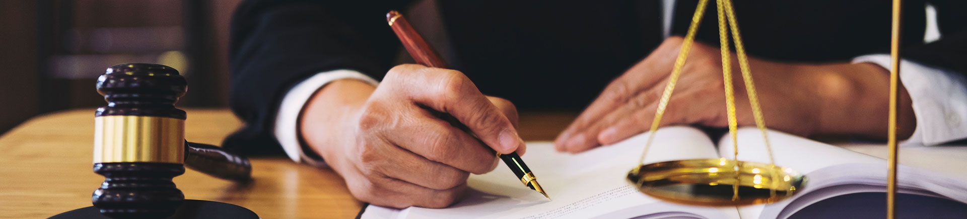 an attorney working at his desk in the law office